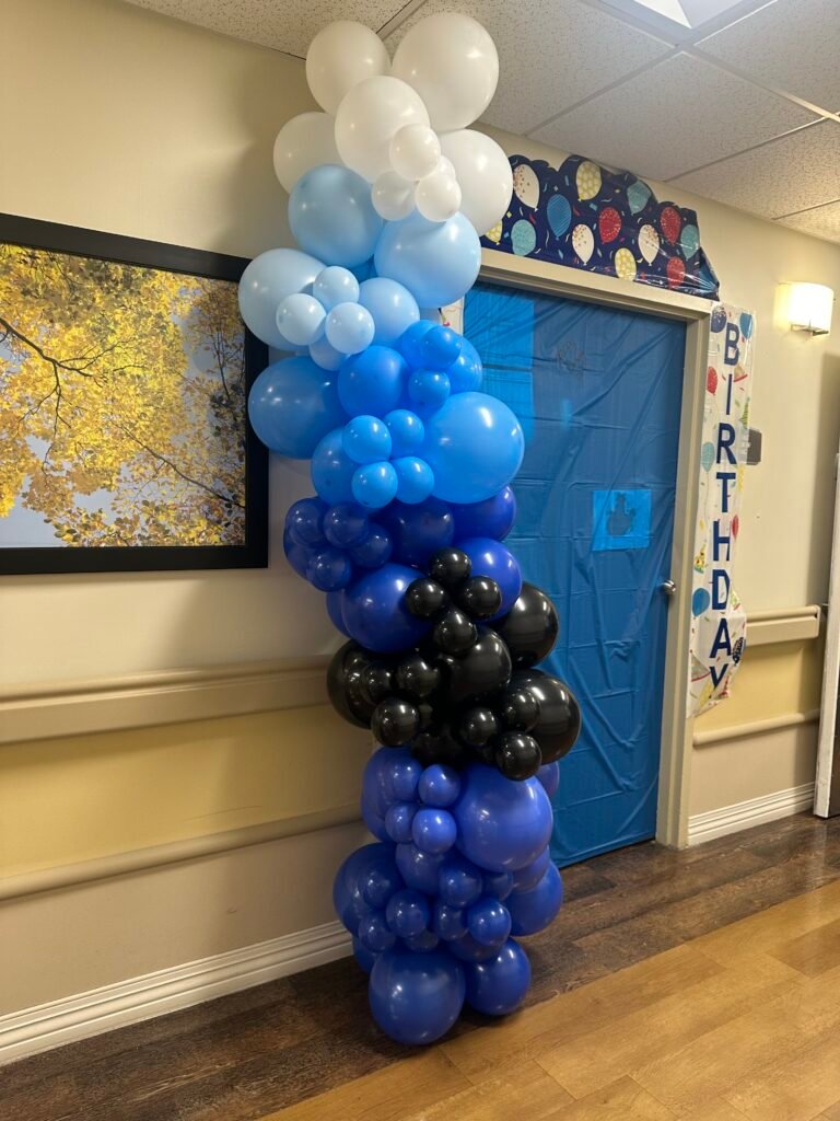 Simple balloon banner setup for birthday party at home