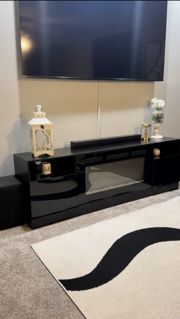 Wayfair Living Room Glow-Up (Budget Friendly) black fireplace tv stand modern living room setup with mounted tv